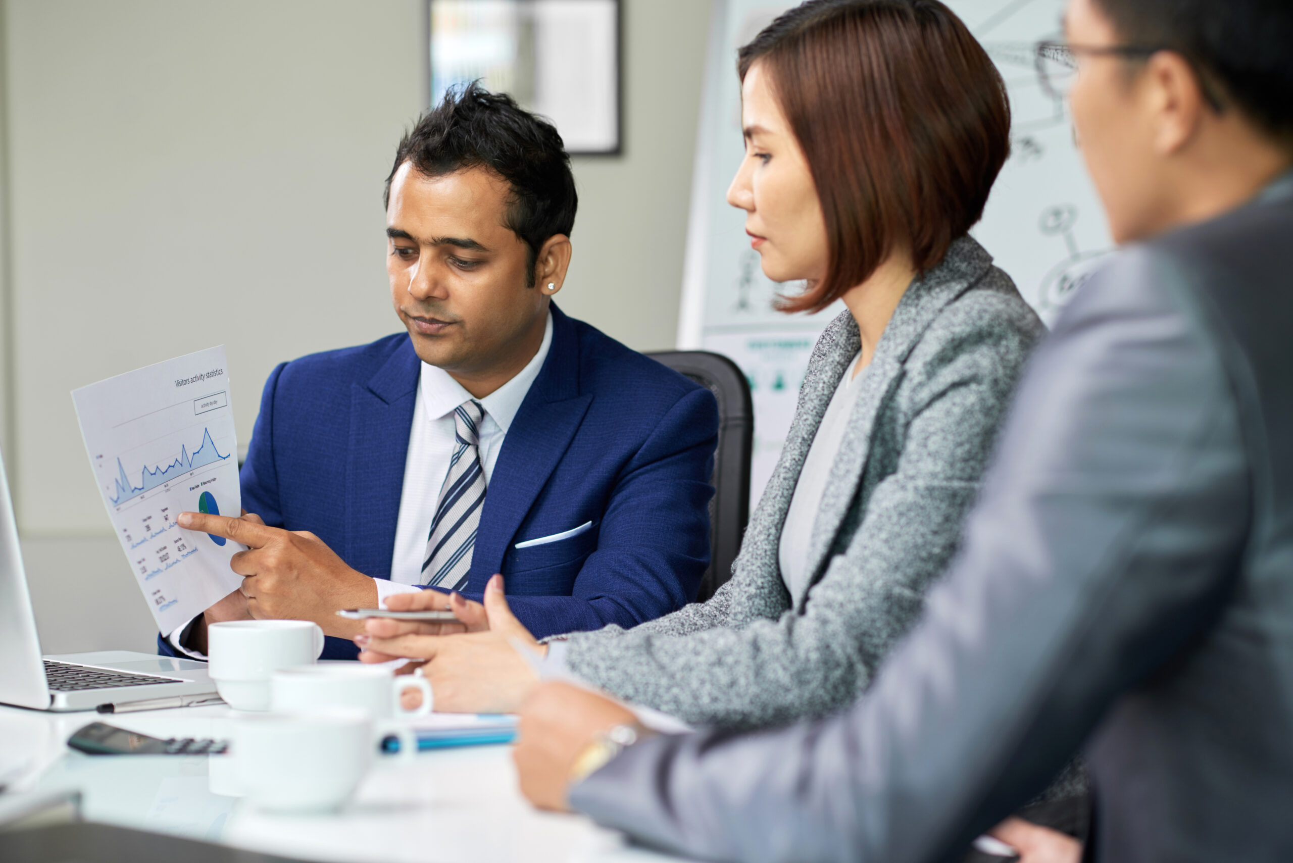 business people working financial degrees scaled